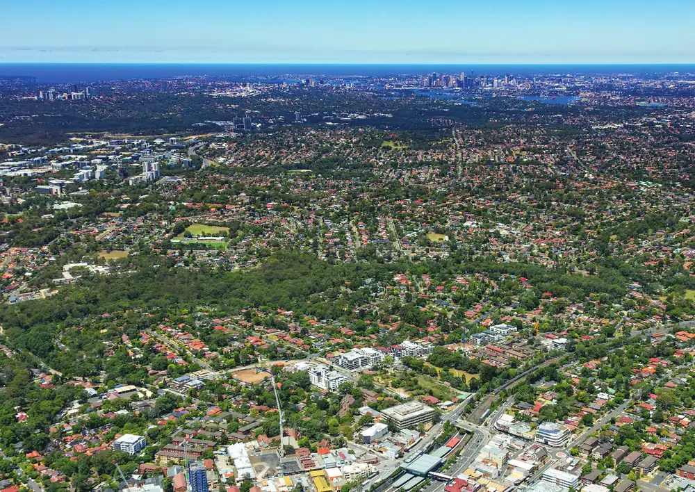 Aerial photograph of Epping looking toward the Sydney CBD skyline, with the Origin Stage 2 site marked